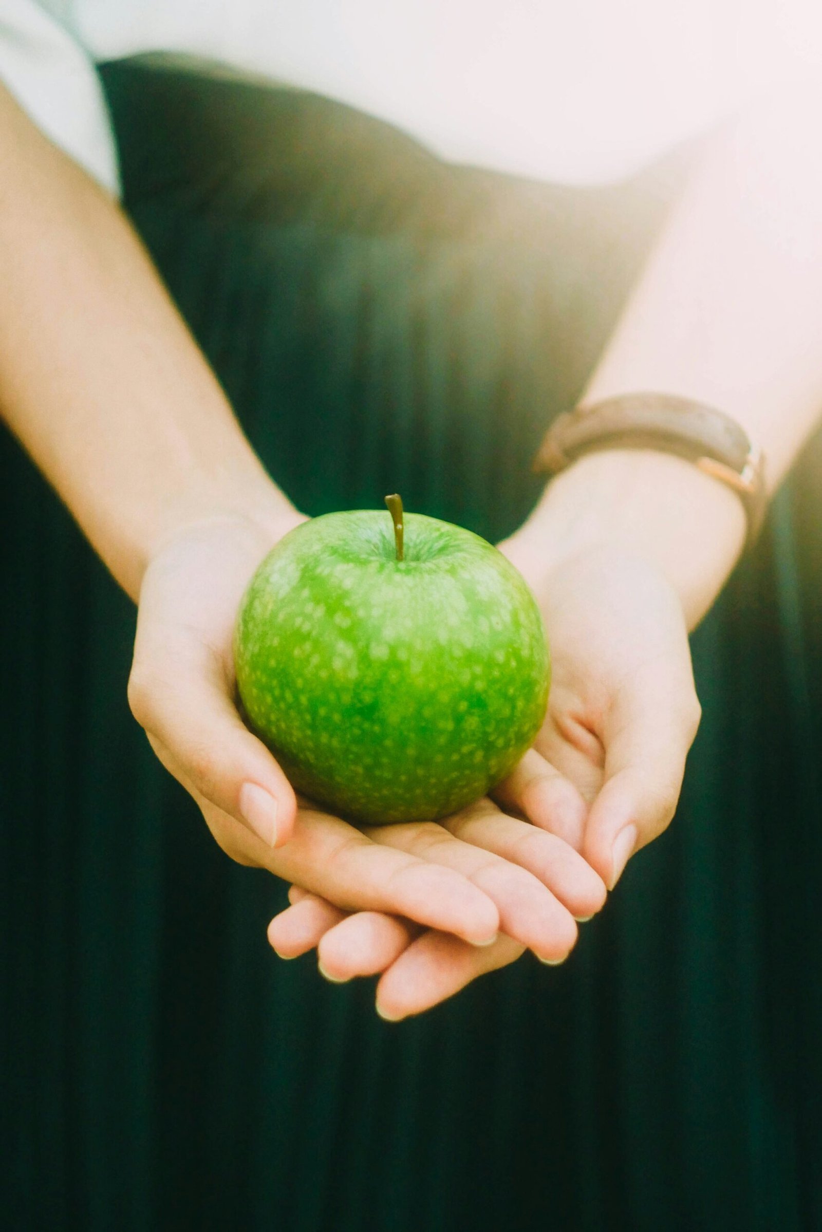 Woman Holding Apple